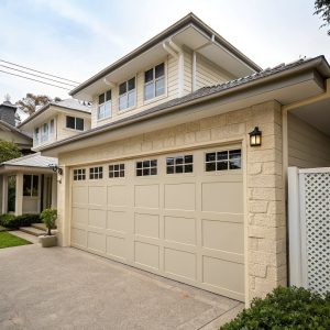 A beige sectional garage door