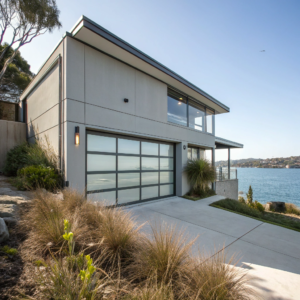 Marine-grade aluminium garage door installed on a waterfront home in Clareville NSW